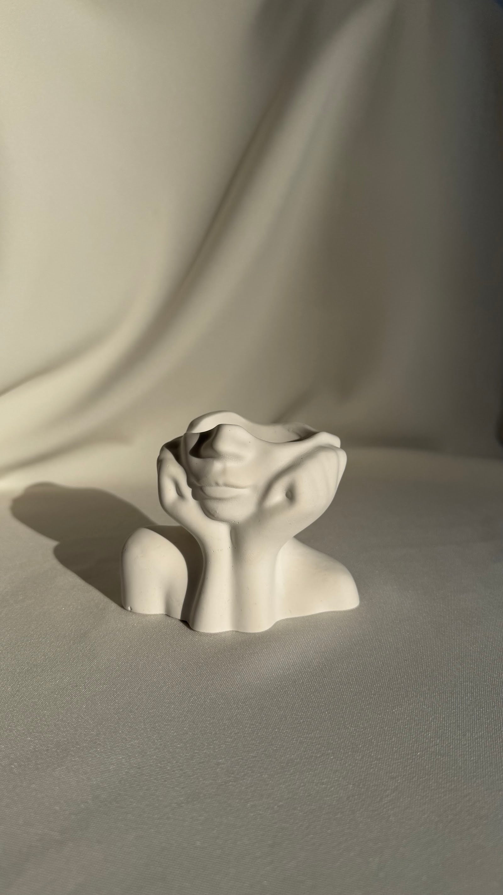Face-Shaped Sculpture - white concrete